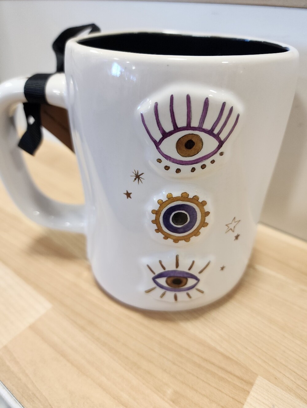 Rae Dunn White Ceramic Mug with Black Interior and Text